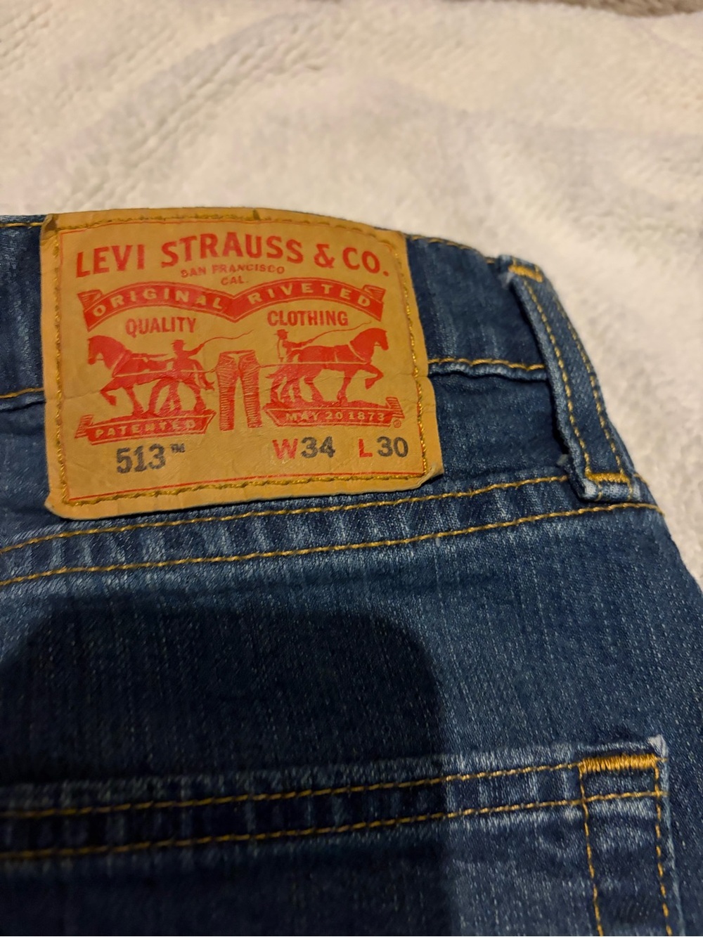 Levi's 513 Slim Straight Jeans - Blue Denim with Tan Patch